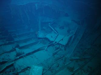 Large pieces of twisted steel plate and ribs on seabed